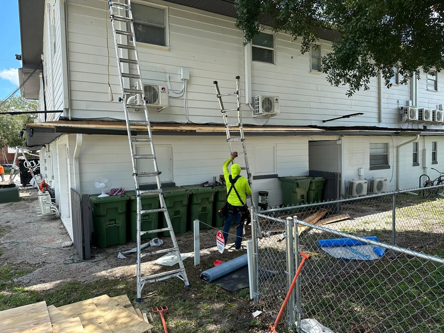 Crew working on a multifamily roof